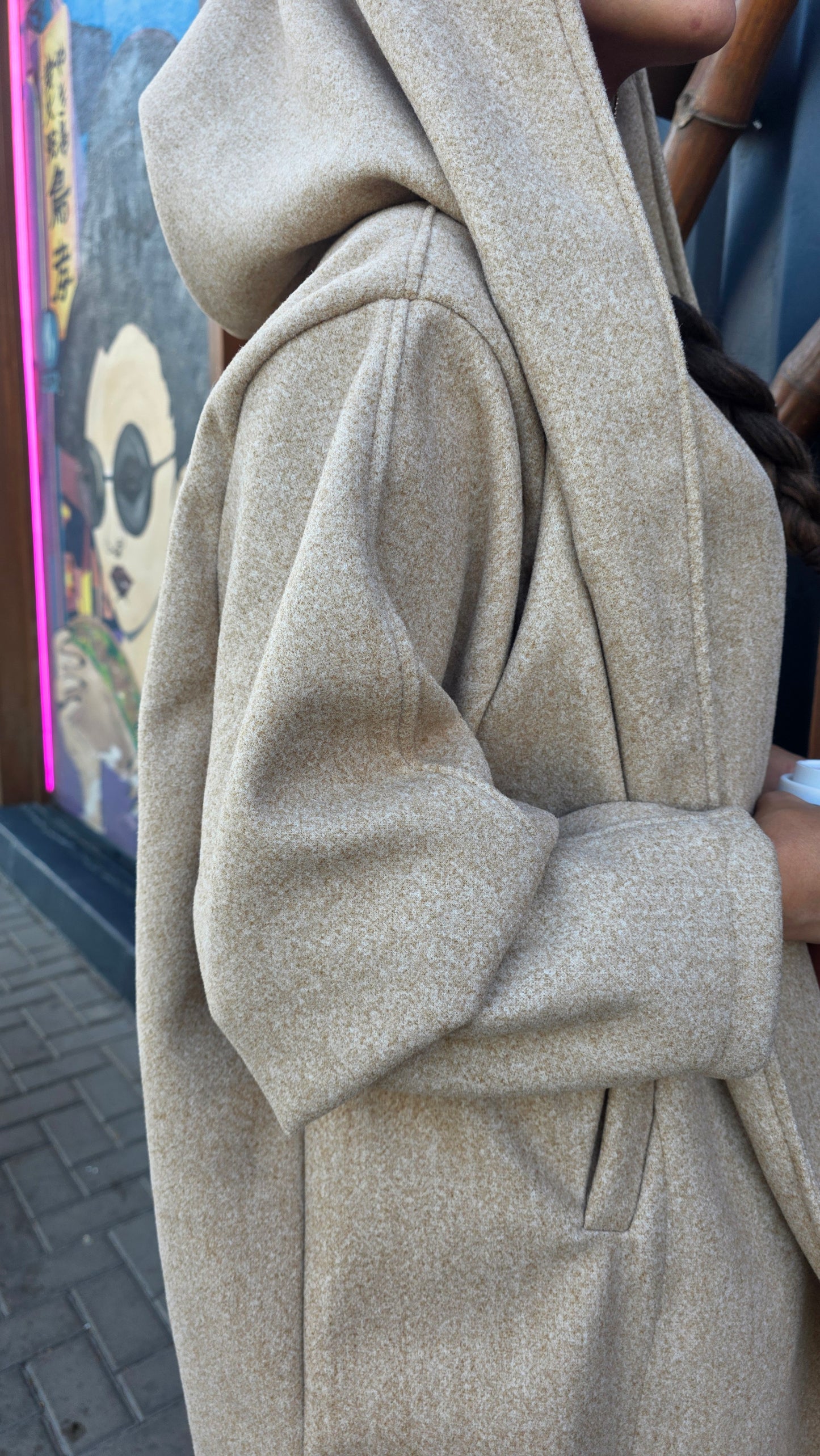 The Mysterious Beige Coat