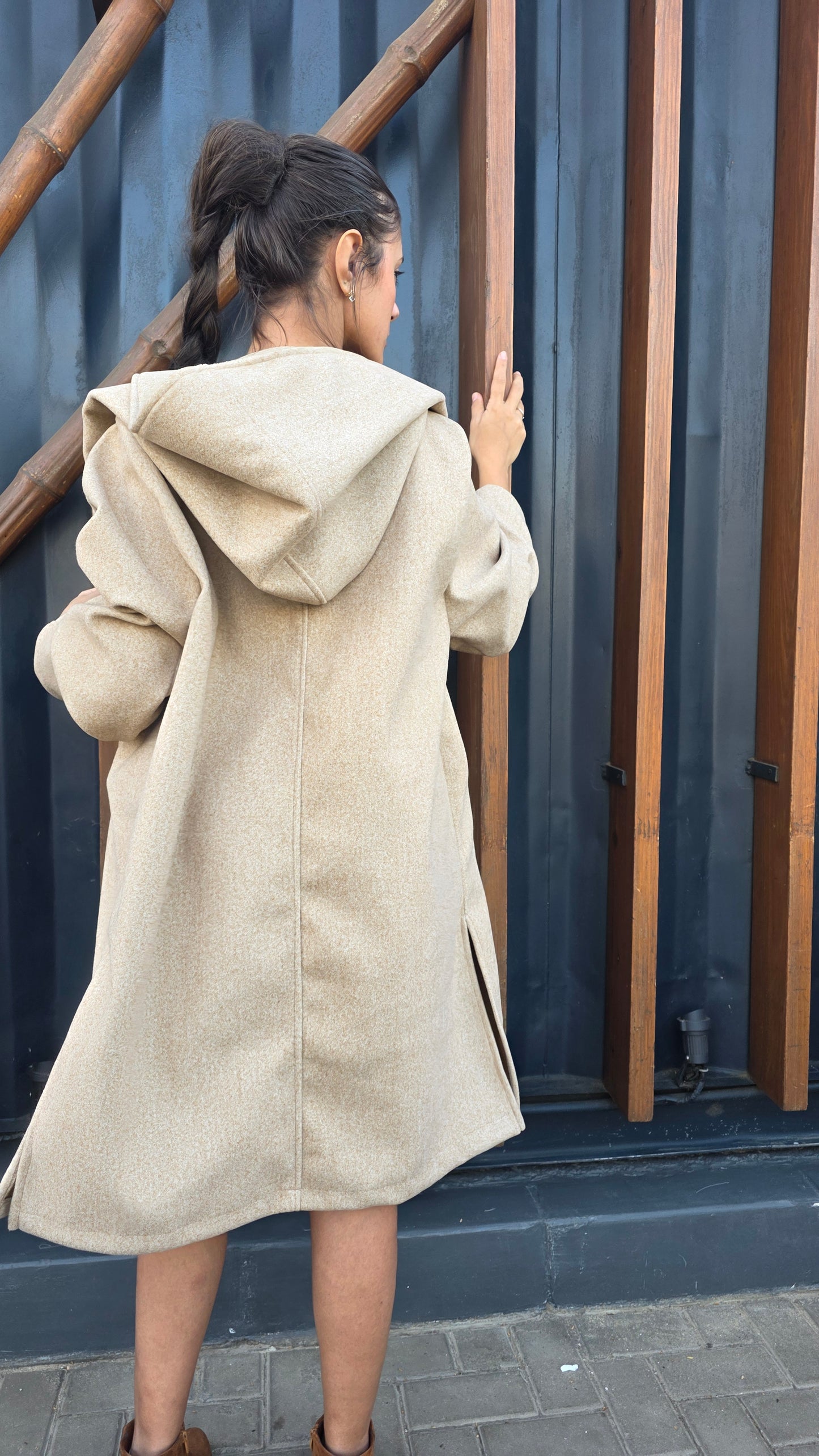 The Mysterious Beige Coat