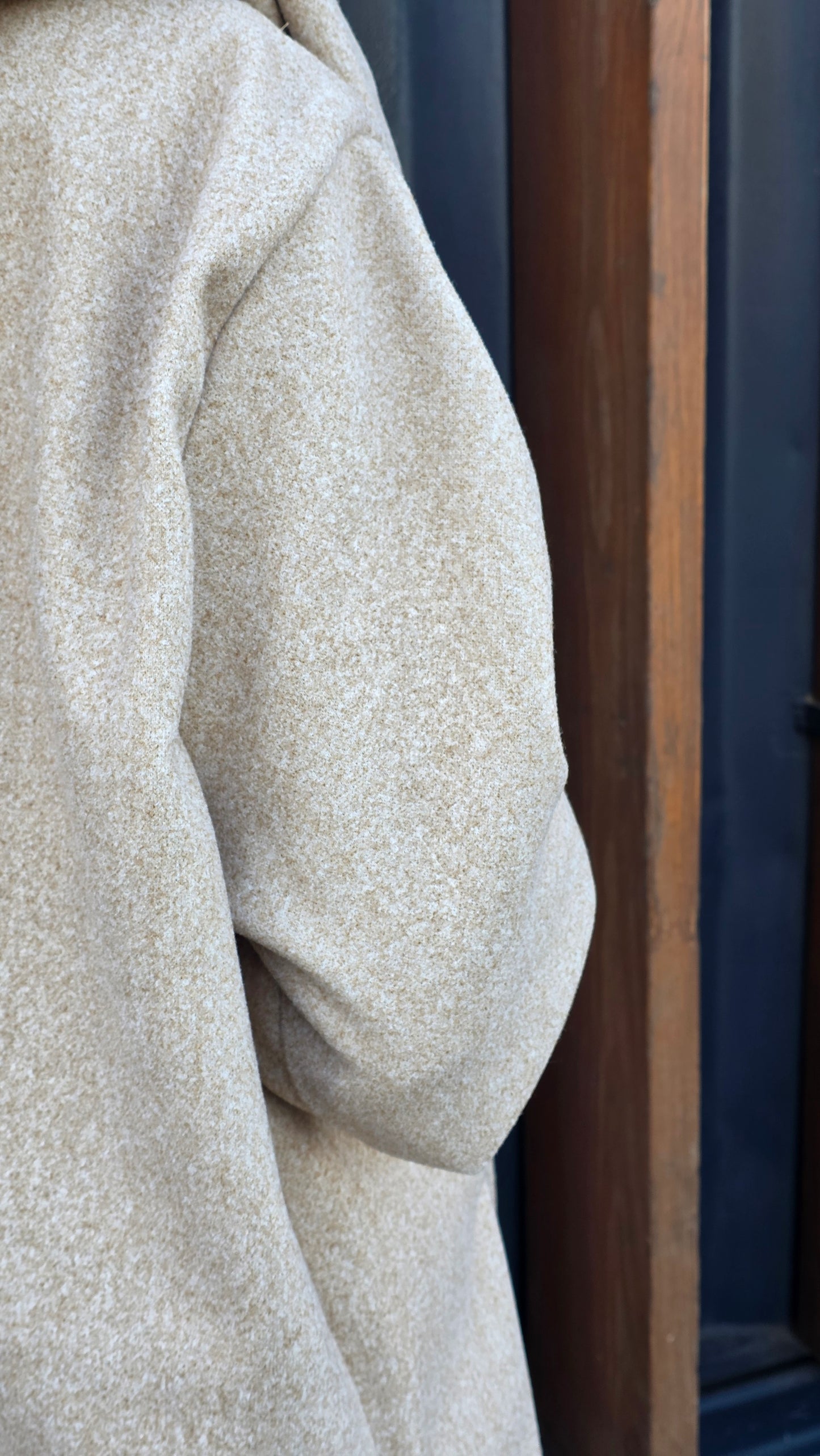 The Mysterious Beige Coat