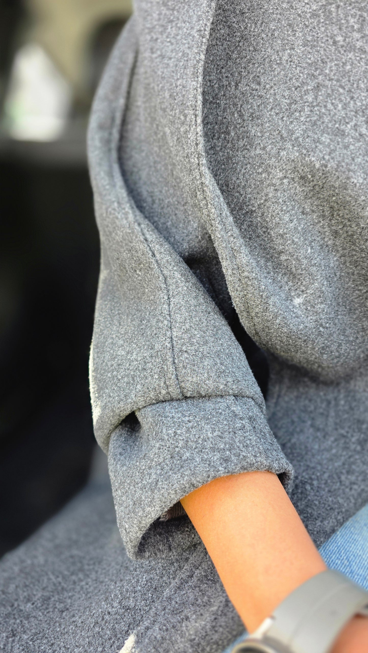 The Mysterious Charcoal Gray Coat